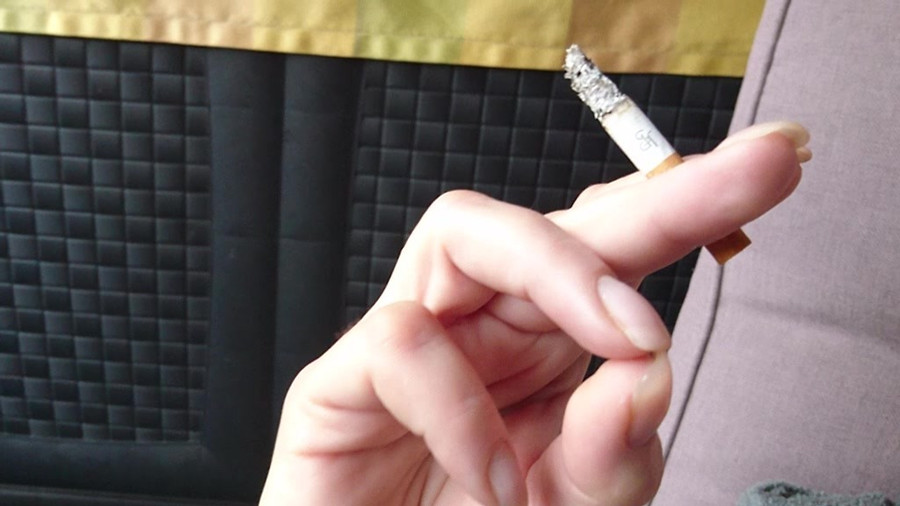 Outside in a bathrobe