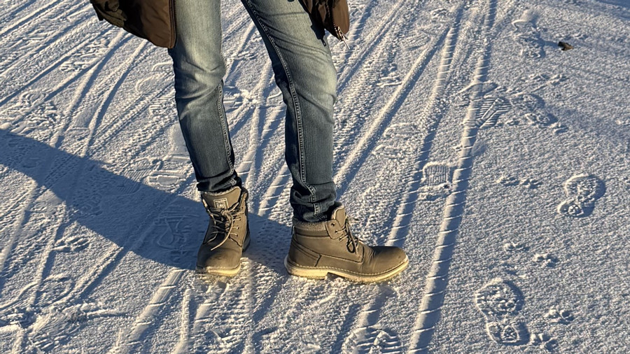 In jeans pants winter and snow